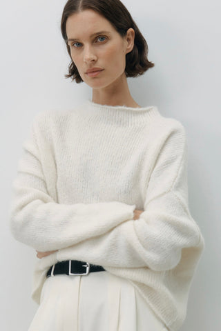 Model wears a Cream Knit