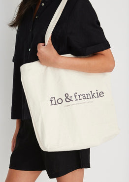 Model wears flo and frankie natural tote bag