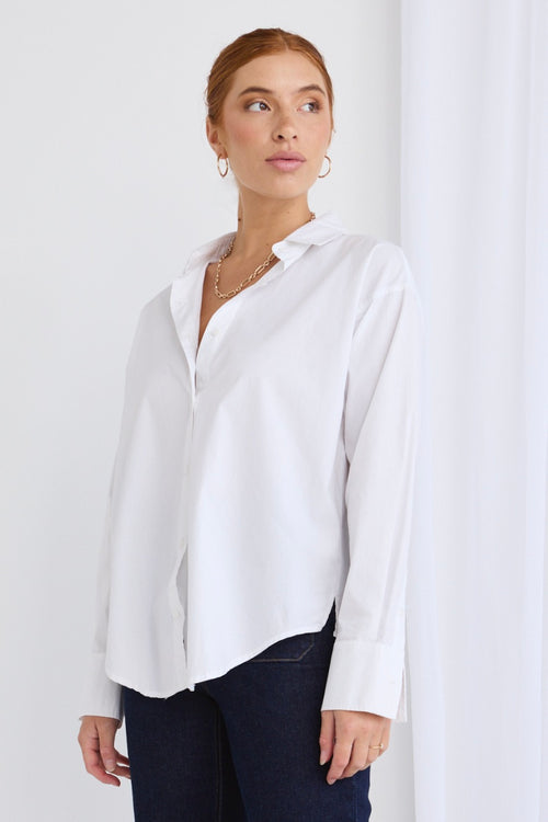 Model wears a white shirt