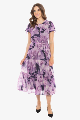 model in purple floral maxi dress