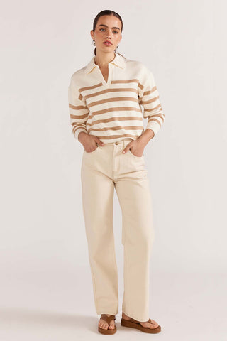 model wears a beige stripe knit