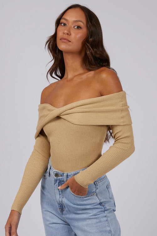 model wears Tan Off Shoulder Knit Top