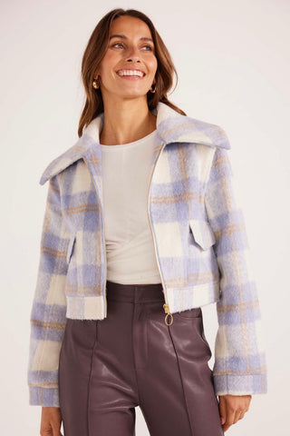 model wears a Blue Check Cropped Jacket