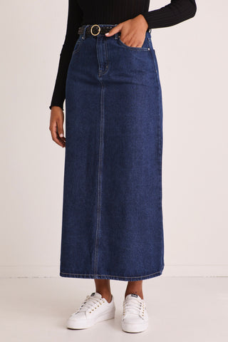 model wears a blue denim maxi skirt