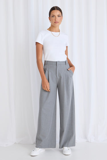 model wears a grey pant