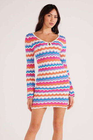 Model wears stripe knit mini dress