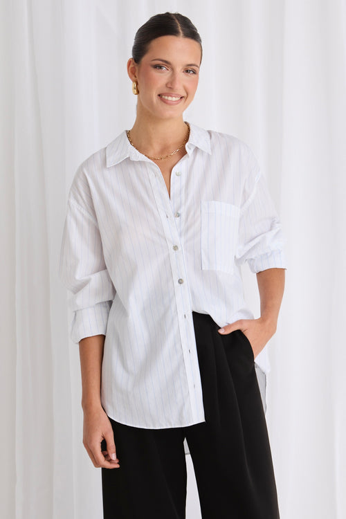 model wears a white stripe shirt