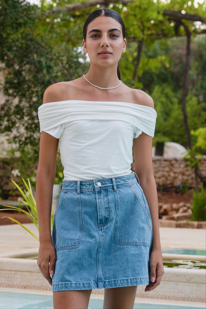 Shop Orchard Mid Blue Pocket Front Denim Mini Skirt | Flo & Frankie