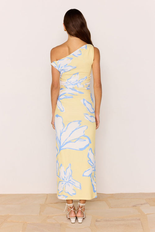 Model wears a yellow blue ruched dress