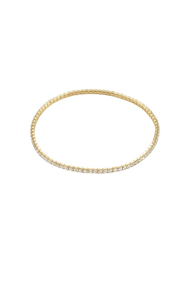 Gold bracelet on a white background