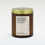Candle jar labeled 'Golden Coconut' on a white background