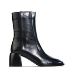 Black leather ankle boot on a white background