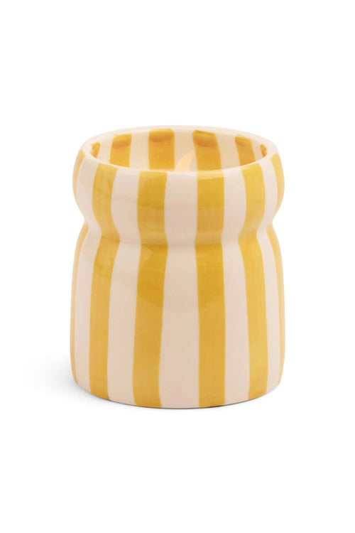 yellow striped candle