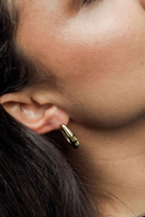 organic wavy gold earring