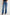 Person wearing blue jeans on a white background