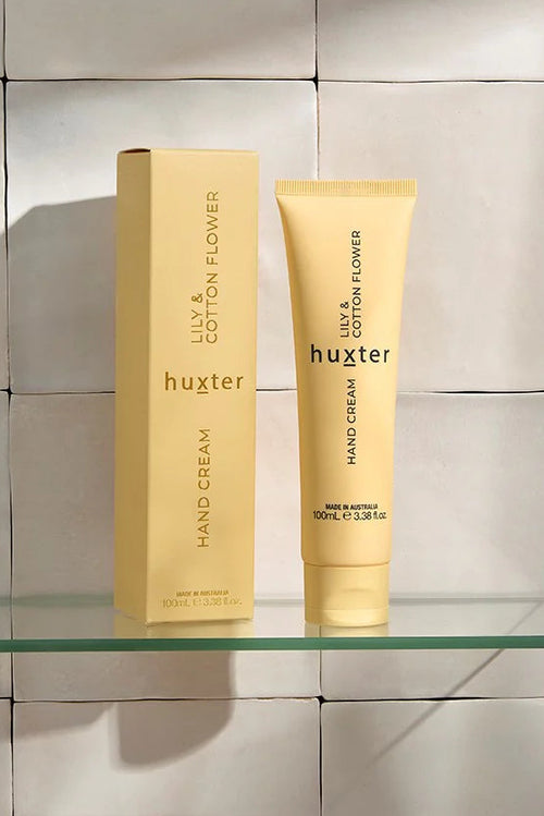 A yellow tube of Huxter hand cream in the scent 
