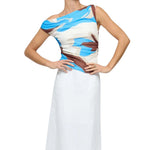 Woman wearing a colorful dress with a white background