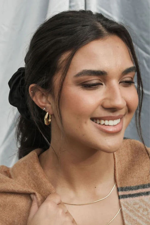 organic wavy gold earring