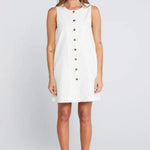 Woman wearing a light floral button down mini dress