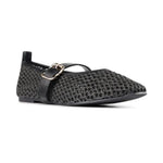 A single black pointed-toe flats with a textured, openwork mesh-like upper and a thin strap across the instep with a small gold-tone buckle, shown on a plain white background.