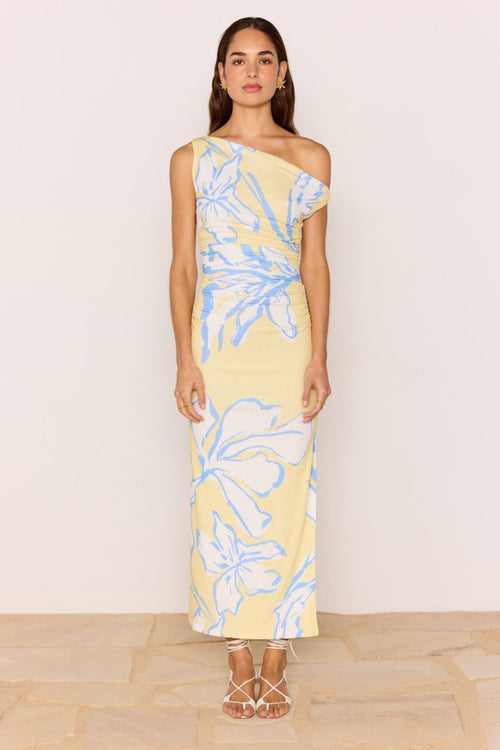 Model wears a yellow blue ruched dress