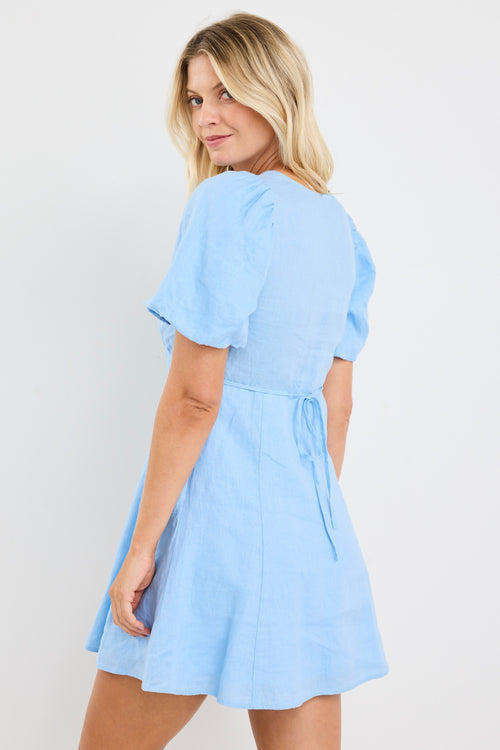 Model wears a short sleeve light blue mini dress