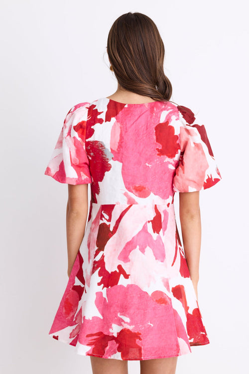 back of a red white pink floral mini dress