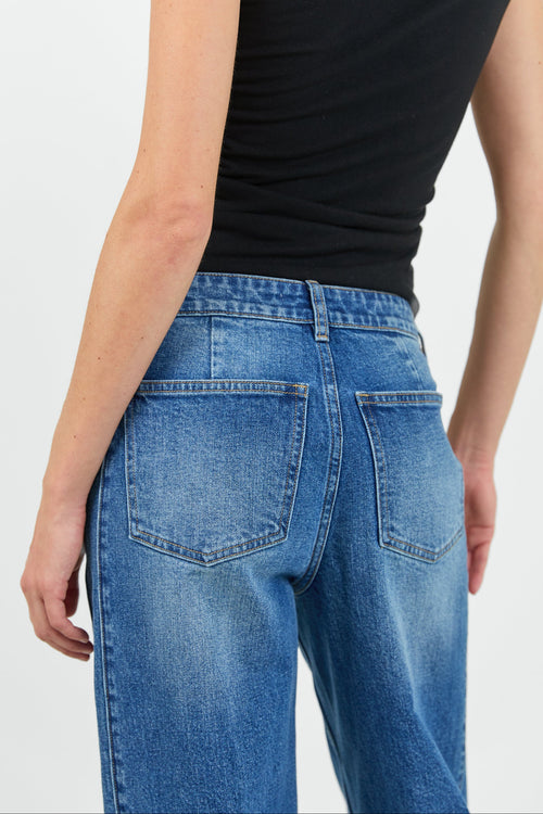 Women wearing wash blue jean and black tank