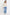Woman wearing a beige sweater and blue jeans on a white background