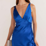 model wears blue satin midi dress