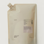 Beige plastic bottle with a pump on a white background, featuring the brand 'Ashley & Co'.