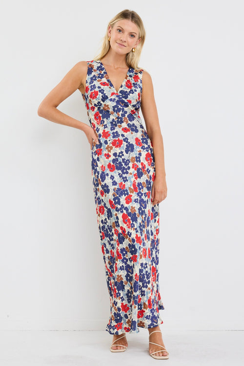 Woman wearing a floral dress on a white background