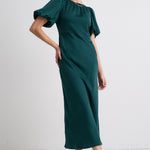 model wears a Green Satin Maxi Dress 