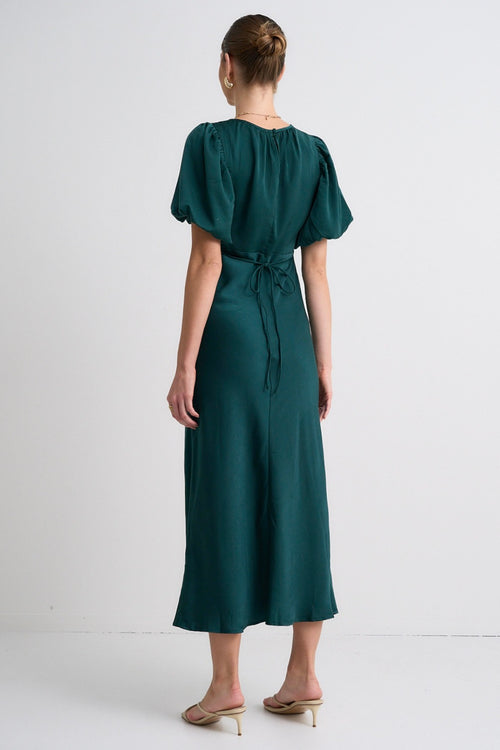 model wears a Green Satin Maxi Dress 