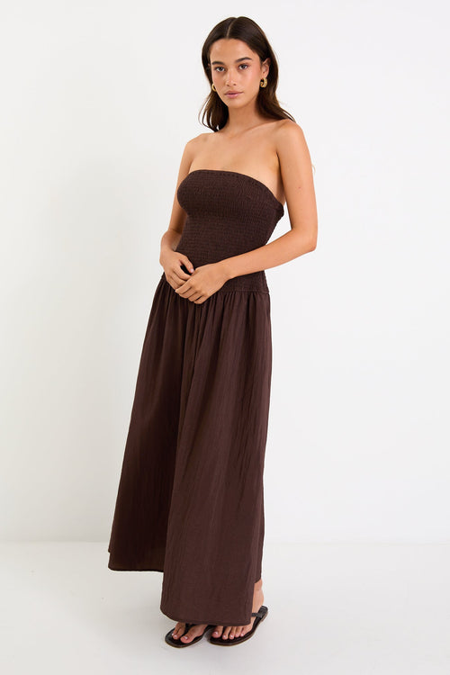 Woman wearing a brown dress