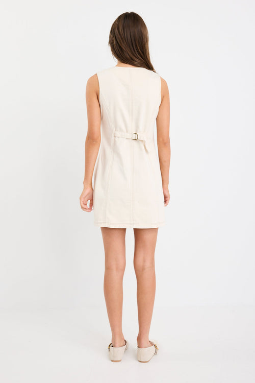 light denim mini dress with button front on model