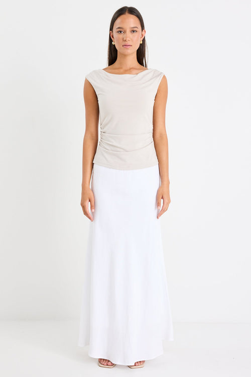 Woman wearing a white skirt 