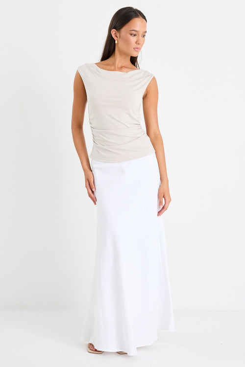 Woman wearing a white skirt 