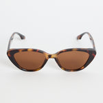 A pair of brown tortoiseshell cat-eye sunglasses with slim arms, photographed on a white background.
