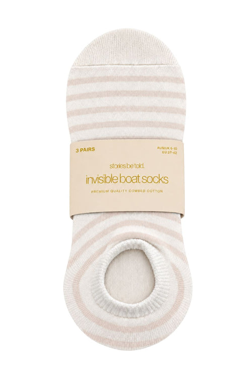 Beige and ivory three-pack invisible boat socks in stripe and polka dot designs, presented in Stories Be Told packaging.
