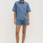 Model wearing denim shirt 