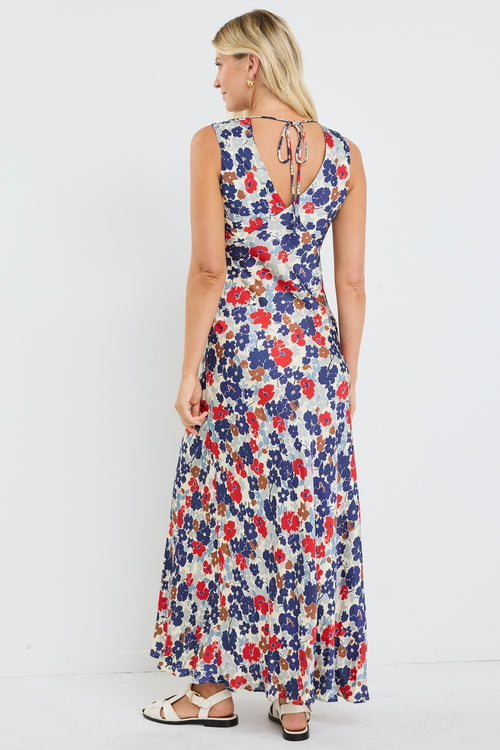 Woman wearing a floral dress on a white background