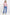 Woman wearing a pink sweater and blue jeans on a white background