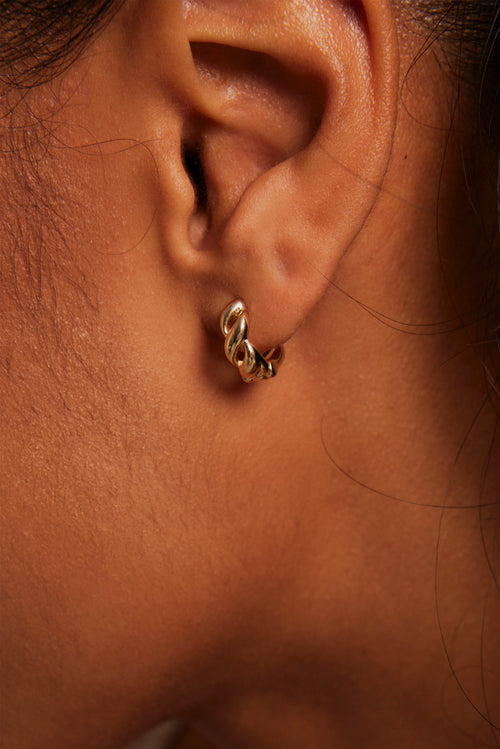 model wearing Chain Hoop Gold Earrings