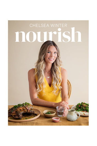 Book cover of 'Nourish' by Chelsea Winter featuring a woman at a dining table with food.