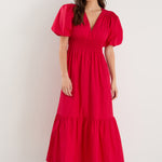 model wearing red puff sleeve dress 