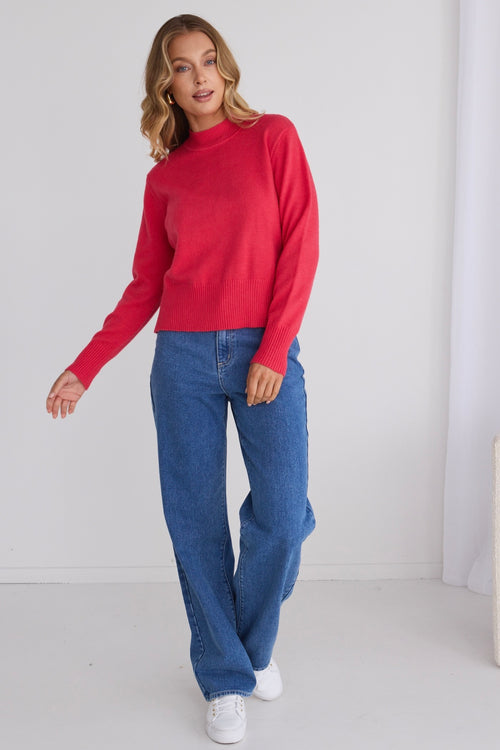 model wears a pink knit jumper