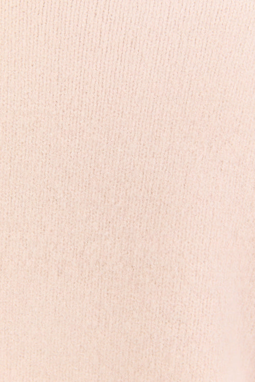 Close-up of a light pink fabric texture