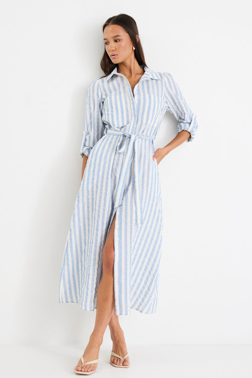 model wears a blue and white stripe shirt midi dress