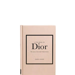 Book titled 'Little Book of Dior' on a white background